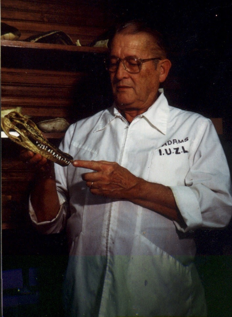 Dick Adams holding a crocodile skull